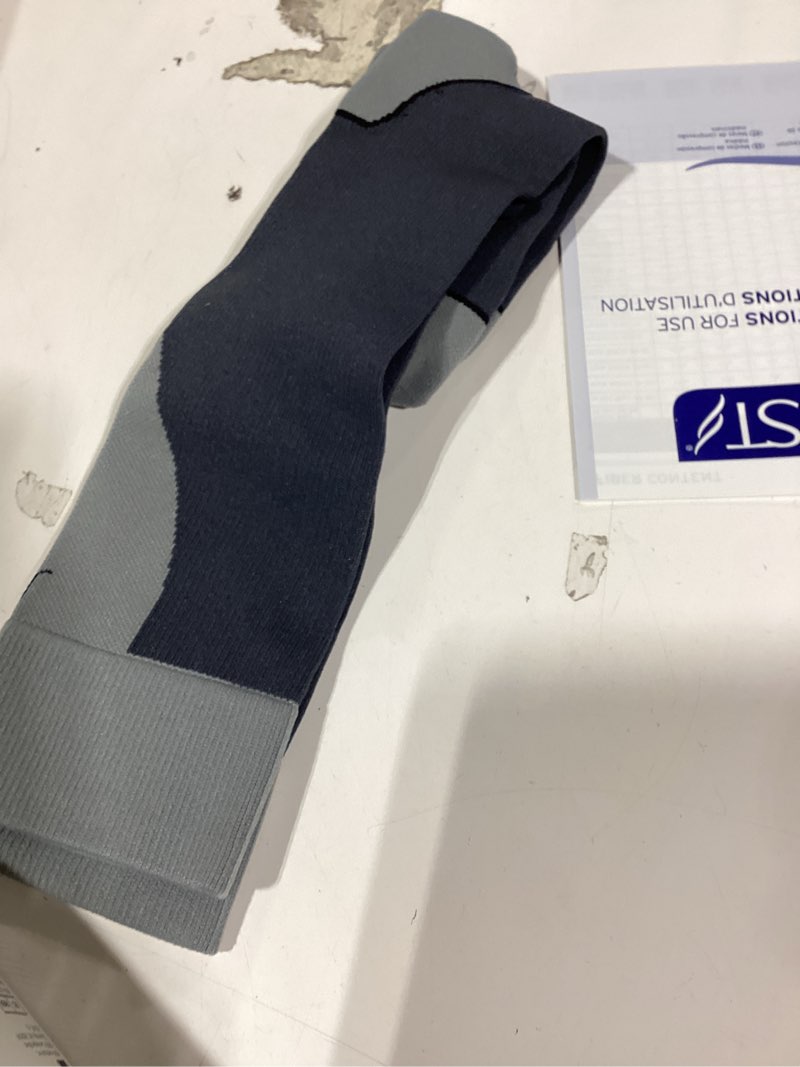 Condition photo showing Good Condition for bsn medical 7529012 jobst sock, knee high, 20-30 mmhg, closed toe, large, blue/grey grey large