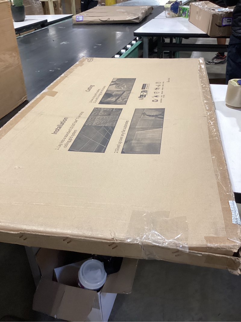 Condition photo showing New/Like New for art3d 12-pack drop ceiling tiles 2x4 ft, pvc decorative ceiling covering panels for basement kitchen bathroom, 24x48 inch, cover 96 sq. ft, smooth black smooth black 24x48 inch