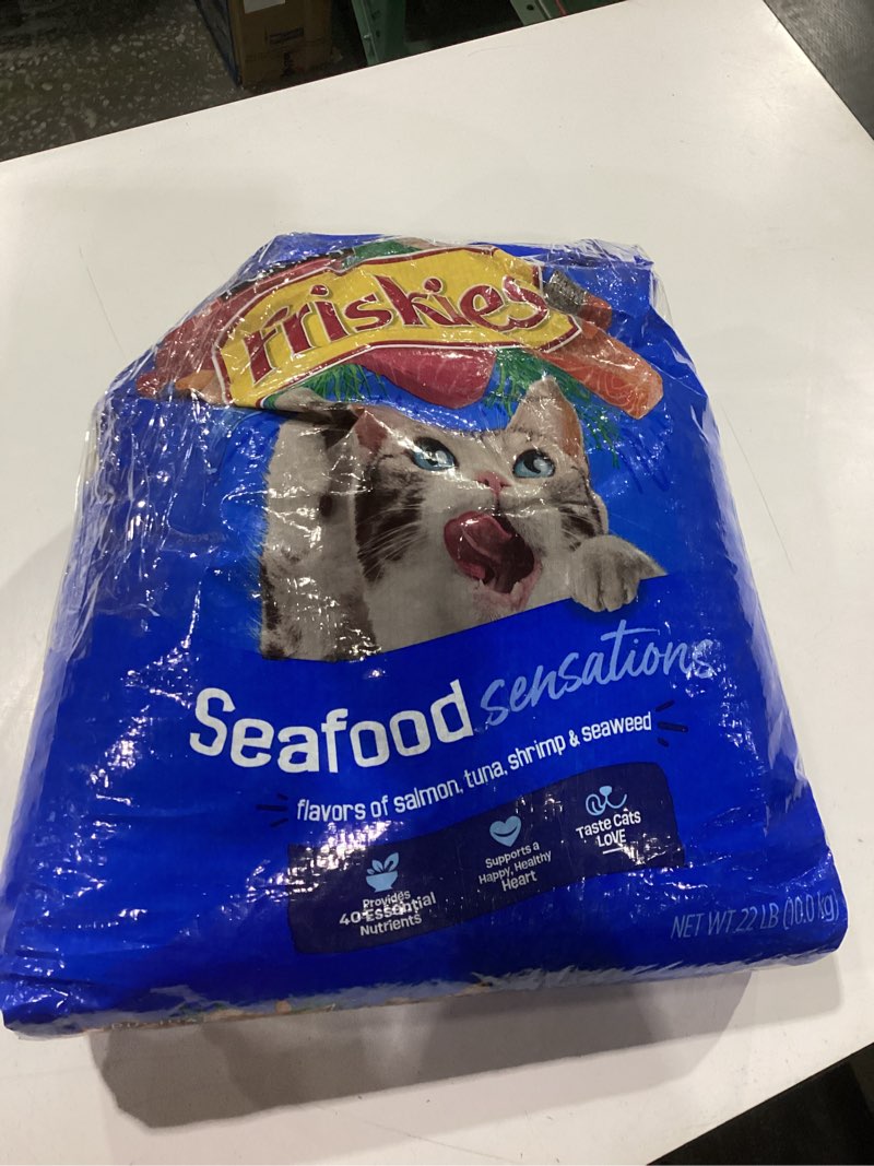 Condition photo showing As Is for purina friskies dry cat food seafood sensations with salmon, tuna, and shrimp flavors - 22 lb. bag 22 pound (pack of 1)