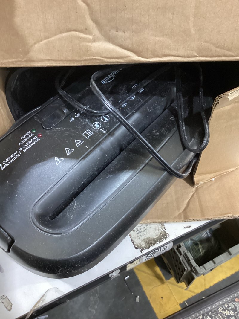 Condition photo showing As Is for Amazon Basics 8-Sheet Cross Cut Paper Shredder and Credit Card Shredder - Black 8 Sheet Black