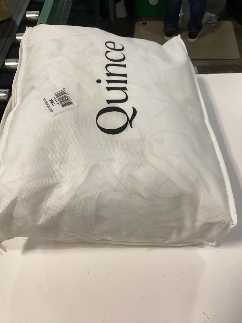 Condition photo showing New/Like New for king size white comforter 