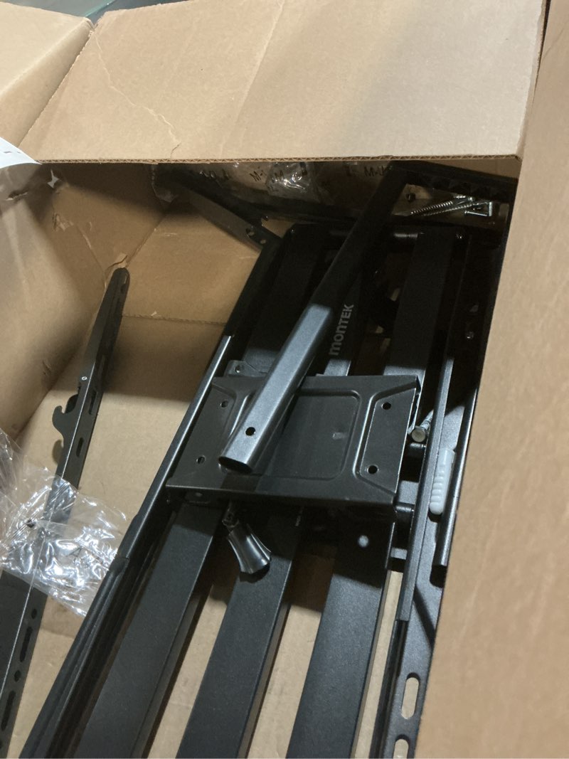 Condition photo showing As Is for monTEK Heavy-Duty Full Motion TV Wall Mount Bracket for 50–100? TVs up to 200 lbs – 4X Load Tested, Dual Arm Extension to 25.1?, Tool-Free Tilt/Swivel/Level, Max VESA 900×600, Fits 12/16/18/24" Studs