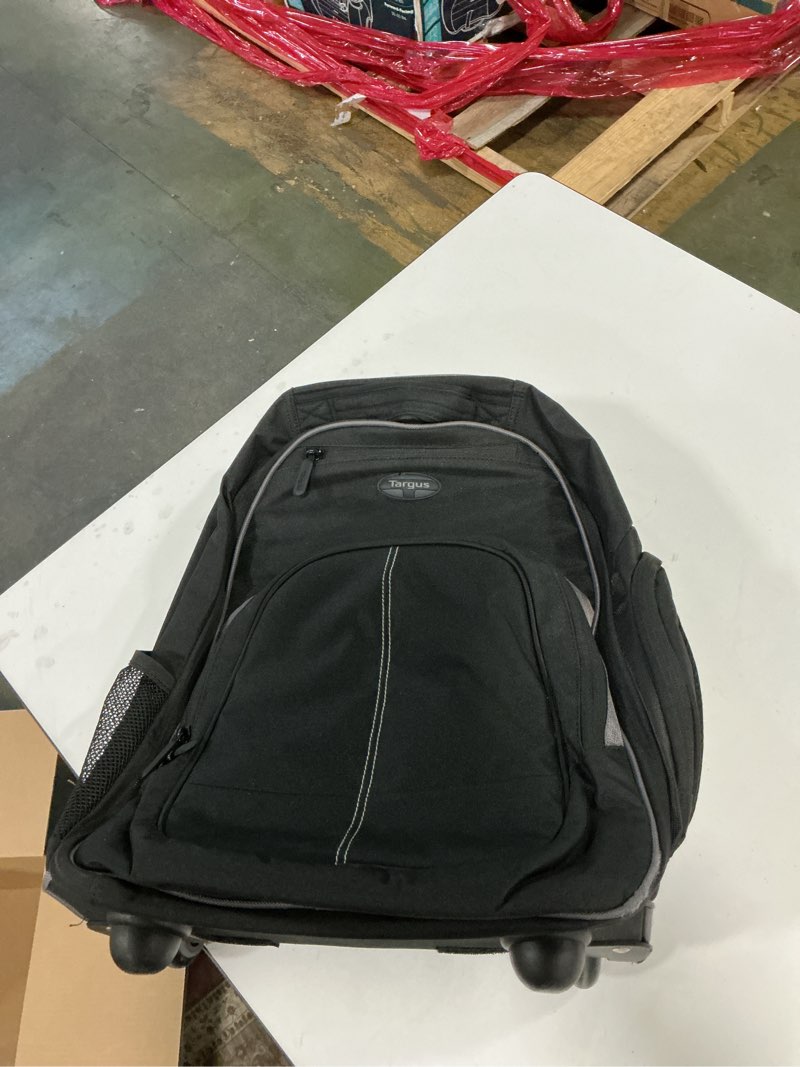 Condition photo showing As Is for Targus 16 Inch Compact Rolling Backpack, Black - Wheeled Travel Bag with Removable Protective Laptop Sleeve, Fits Laptops Up to 16” and MacBook Pros up to 17” (TSB750US)