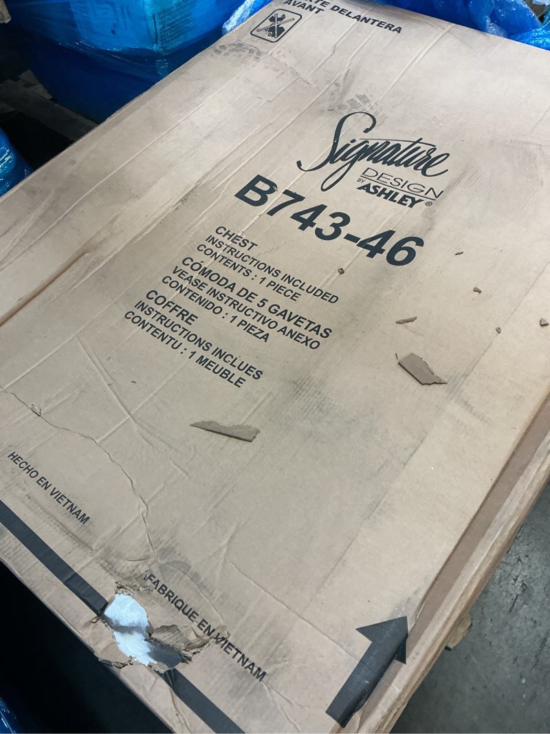 Condition photo showing Good Condition for signature design by ashley realyn french country two tone 5 drawer chest of drawers, chipped white