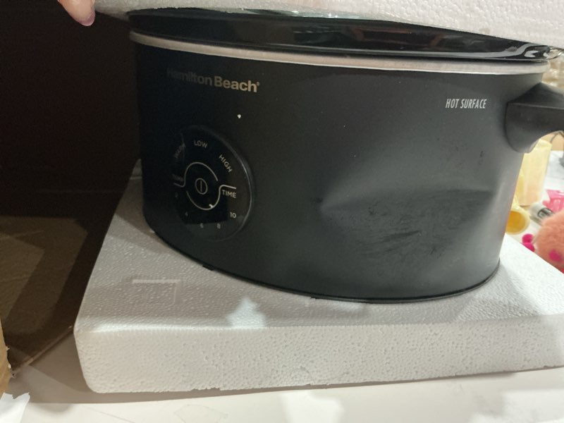 Condition photo showing As Is for item is dented  hamilton beach 6 quart set & forget programmable slow cooker, 15 cooking options with 5 time and 3 heat options, large dishwasher safe stoneware crock and glass, black (33762) 6 quarts, 15 cooking options, black