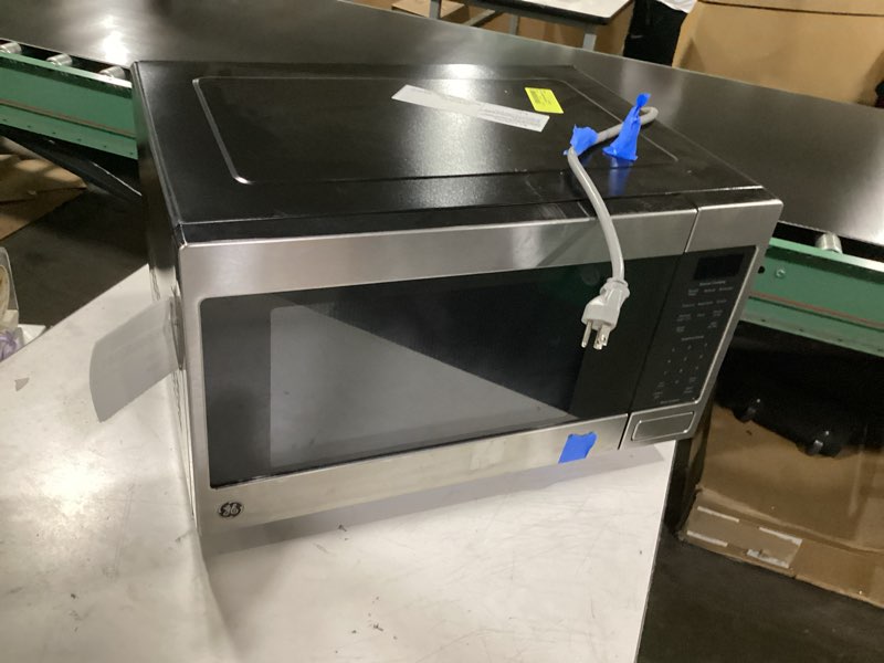 Condition photo showing Good Condition for ge 1.0 cu ft countertop convection microwave oven with air fry stainless steel