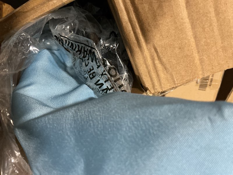 Condition photo showing As Is for possibly used 7 ft. metal beach umbrella in blue with tassel design and cover