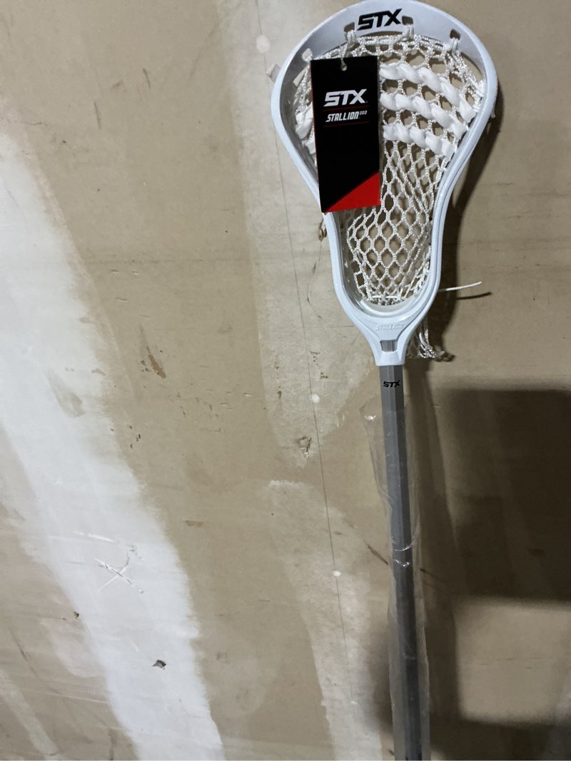 Condition photo showing Good Condition for STX Lacrosse Stallion 200 Boys Complete Stick with Mesh Pocket, Defense, White
