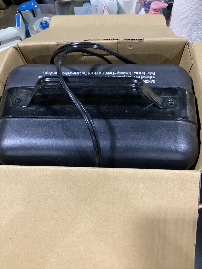 Condition photo showing As Is for utilitech ceramic space heater up to 1500w, 200 sq. ft