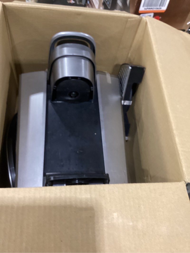 Condition photo showing As Is for keurig k-elite single serve k-cup pod coffee maker, with strength and temperature control, iced coffee capability, 8 to 12oz brew size, programmable, brushed silver