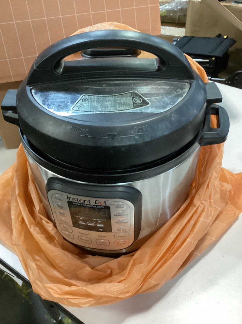 Condition photo showing As Is for Instant Pot Duo 7-in-1 Electric Pressure Cooker, Slow Cooker, Rice Cooker, Steamer, Sauté, Yogurt Maker, Warmer & Sterilizer, Includes App With Over 800 Recipes, Stainless Steel, 8 Quart 8 Quarts