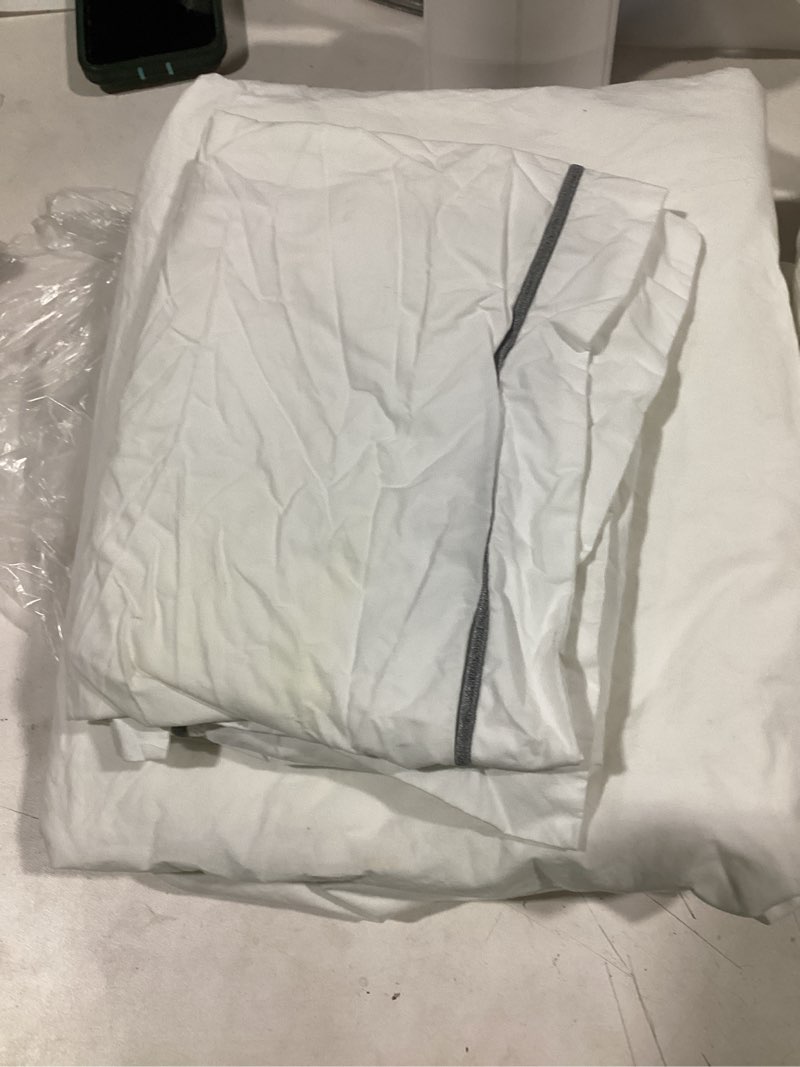 Condition photo showing As Is for quince duvet cover white with grey strip 