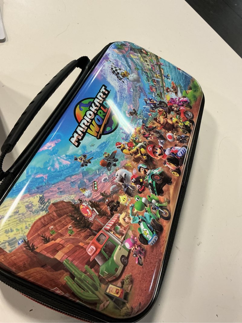 Condition photo showing Good Condition for nintendo switch 2 game traveler deluxe mario kart world case