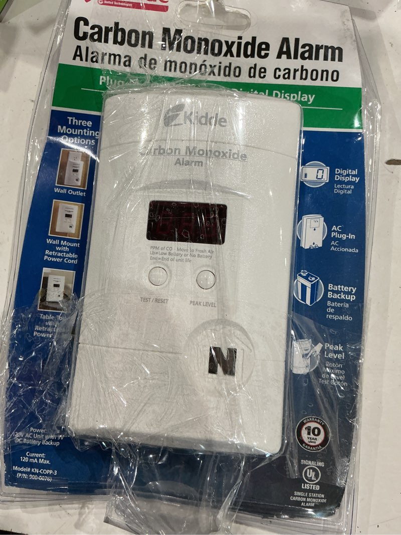 Condition photo showing As Is for kidde nighthawk plug-in w/battery back-up electrochemical carbon monoxide detector