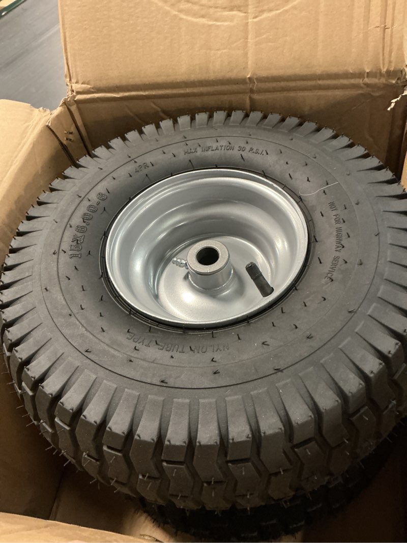 Condition photo showing As Is for ar-pro (2-pack) 15 x 6.00-6 front tire and wheel assembly for riding mower lawn tractor, 3" centered hub, 3/4" sintered iron bushings, 4ply pneumatic with turf tread 15 x 6.00-6" pneumatic (centered hub) silver