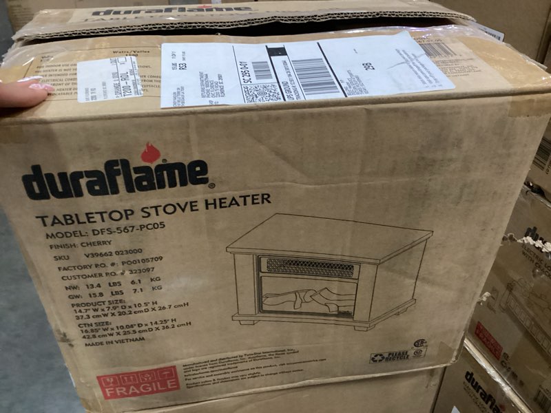 Condition photo showing Good Condition for tabletop stove heater color cherry