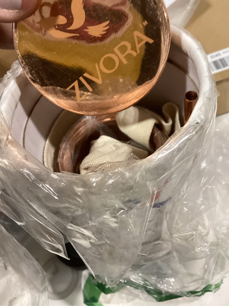 Condition photo showing As Is for 100% pure copper water bottle - 34oz water bottle for drinking with sipper & traditional cap, copper straw, canvas bag & cleaning brush/modern lifestyle with ayurvedic benefits. plain