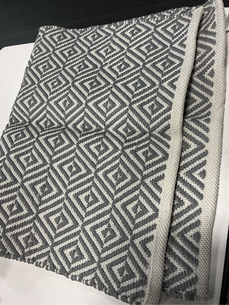 Condition photo showing Good Condition for style selections aztec 2 x 3 (ft) polypropylene grey rectangular indoor solid not washable pet