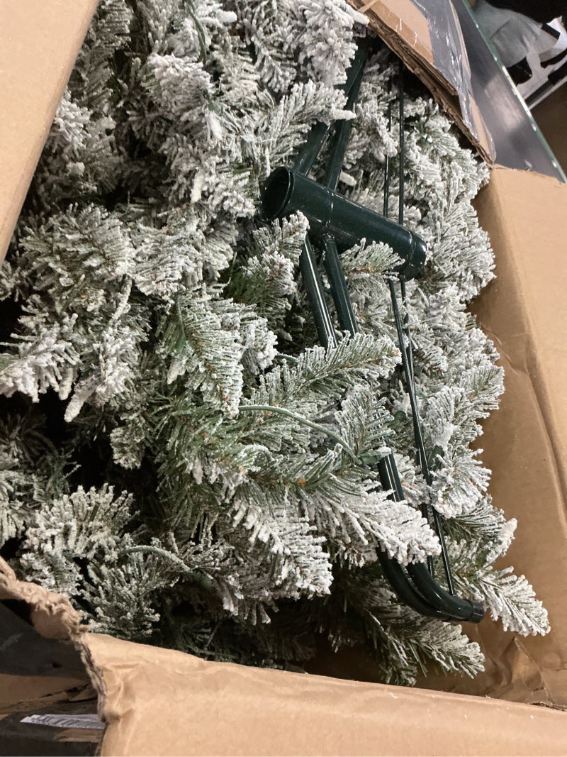 Condition photo showing As Is for Puleo International 7.5 Foot Pre-Lit Slim Flocked Fraser Fir Artificial Christmas Tree with 500 UL Listed Clear Lights 7.5' Slim Flocked Fraser Fir with 500 Clear Lights Christmas Tree
