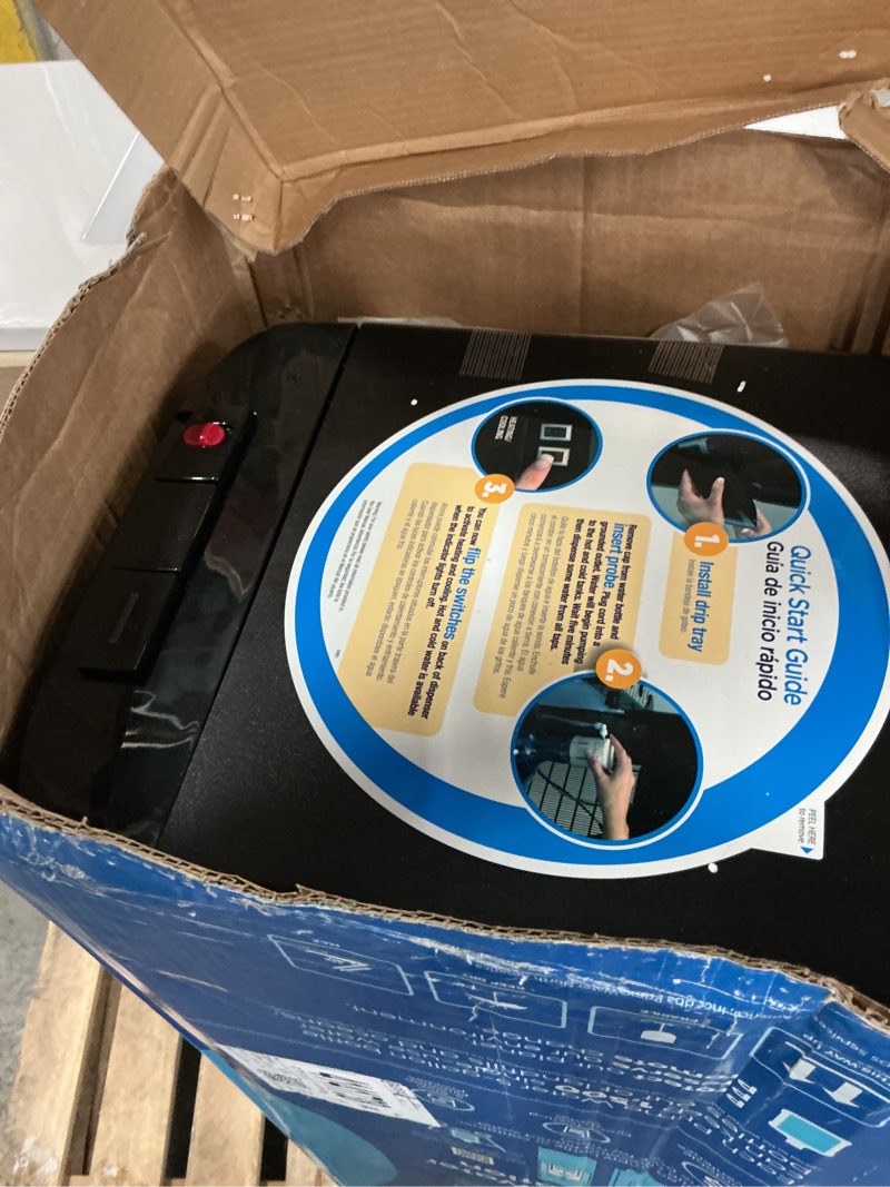 Condition photo showing As Is for primo htrio bottom load water dispense
