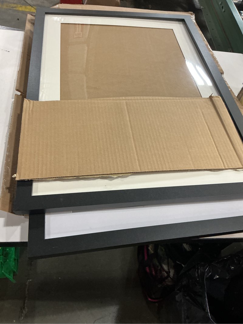 Condition photo showing Good Condition for Set of 2 black picture frames 22”x30” (similar to stock photo)