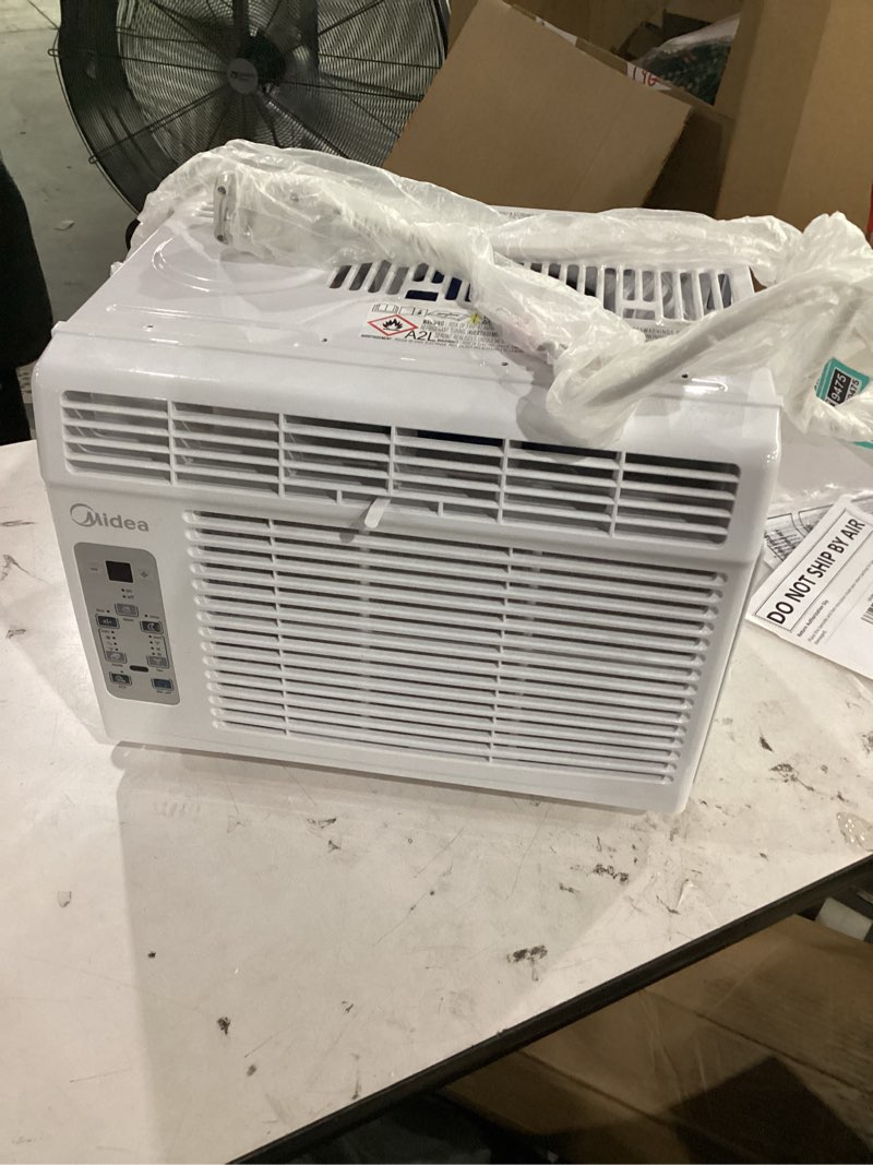 Condition photo showing Good Condition for midea 5,000 btu window air conditioner, cools up to 150 sq. ft. with easy-to-use reusable filter, remote, perfect ac for bedroom, living room, home office, electronic control 5,000 btu, electronic control