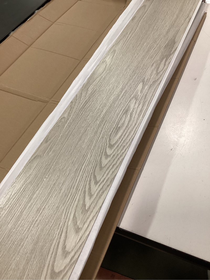 Condition photo showing As Is for ( incomplete 34 pcs only ) Art3d 36-Pack Peel and Stick Luxury Vinyl Flooring Tiles, 54 Sq. Ft Self Adhesive Wood Plank for Kitchen, Bedroom, Bathroom, Grey Ash 36 x 6 x 0.1 inches Grey Ash 36