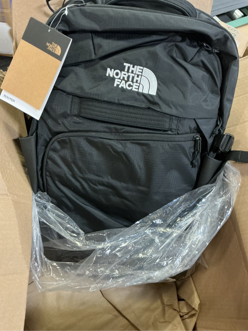 Condition photo showing New/Like New for the north face router everyday laptop backpack | daypack with water repellent finish, 17" laptop sleeve, reflective details one size tnf black/tnf black-npf