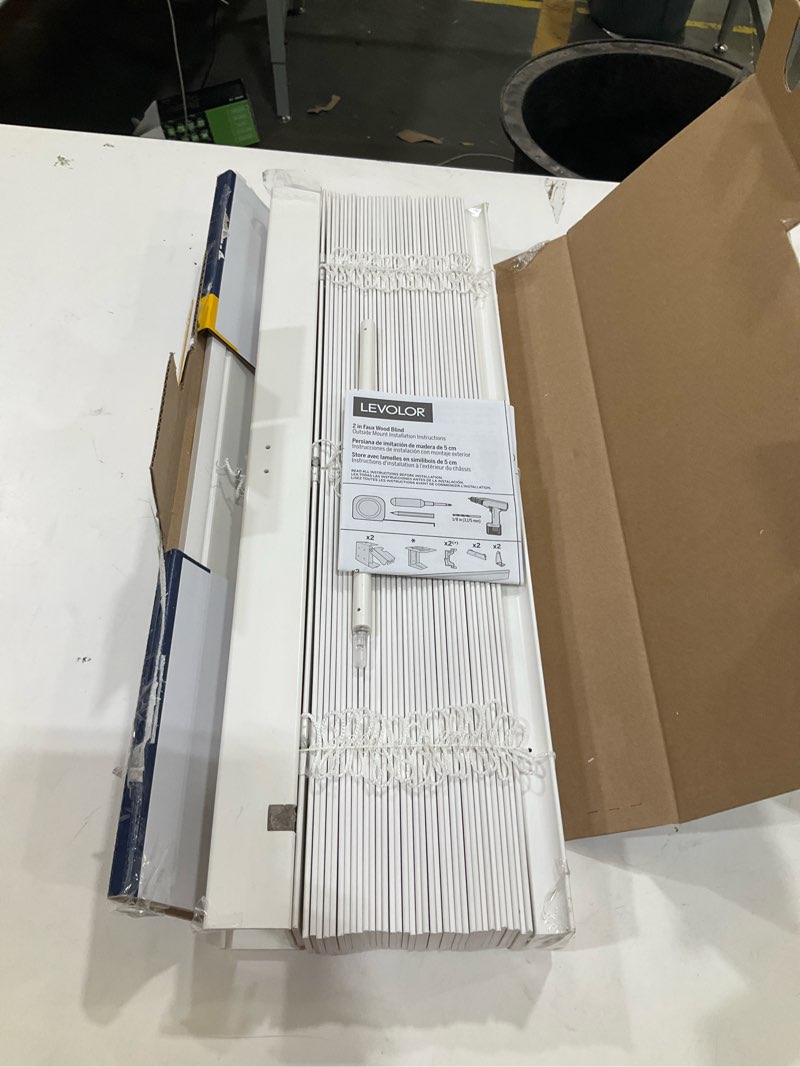 Condition photo showing As Is for levolor trim+go 2-in slat width 27-in x 64-in cordless white faux wood room darkening full-view standard horizontal blinds