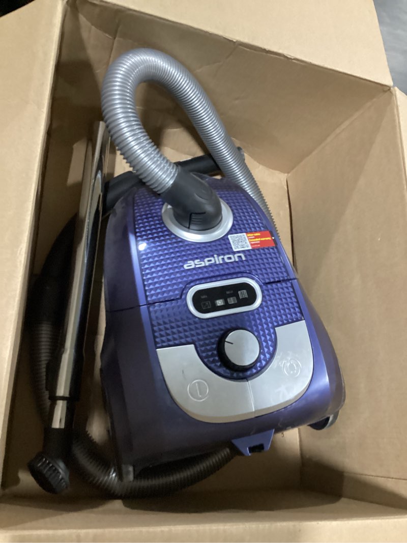 Condition photo showing As Is for incomplete aspiron canister vacuum cleaner, 1300w bagged canister vacuum, turbo brush, 5 tools, 3.7qt, h13 hepa filter, automatic cord rewind, vacuum cleaner for carpets, hardwood floors, pet hair, blue