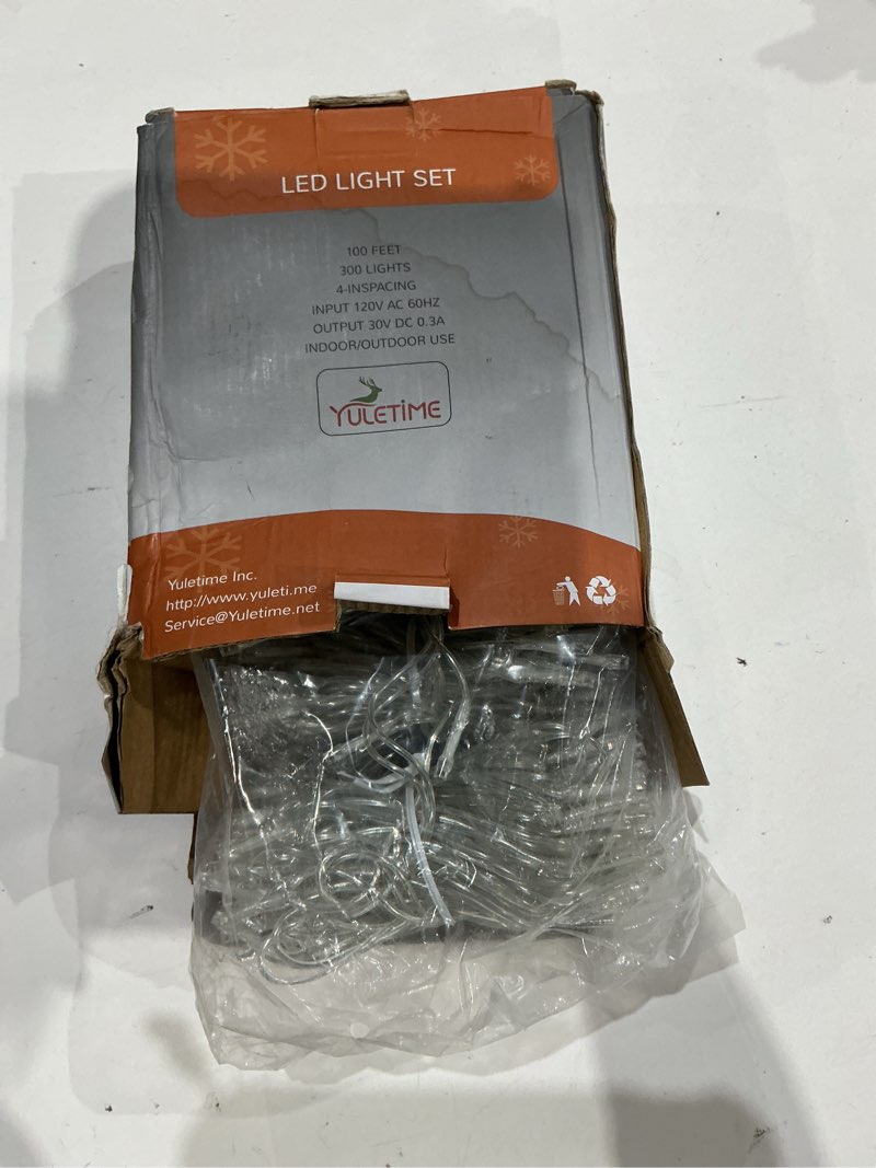 Condition photo showing As Is for yuletime 100 ft 300 count warm white led string lights with 8 models adapter, clear wire wide angle 5mm christmas lights (warm white - multimode)