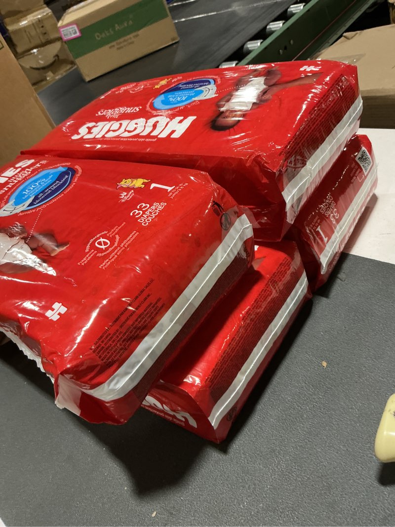 Condition photo showing Good Condition for (missing 2 packs) huggies size 1 diapers, little snugglers diapers, size 1 (8-14 lbs), 198 count (6 packs of 33), packaging may vary size 1 198