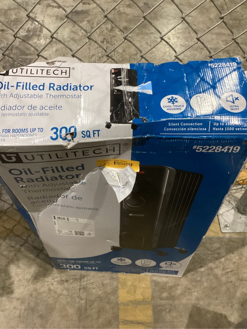 Condition photo showing As Is for Utilitech Oil-Filled Radiator With Adjustable Thermostat Blk. New Free Shipping