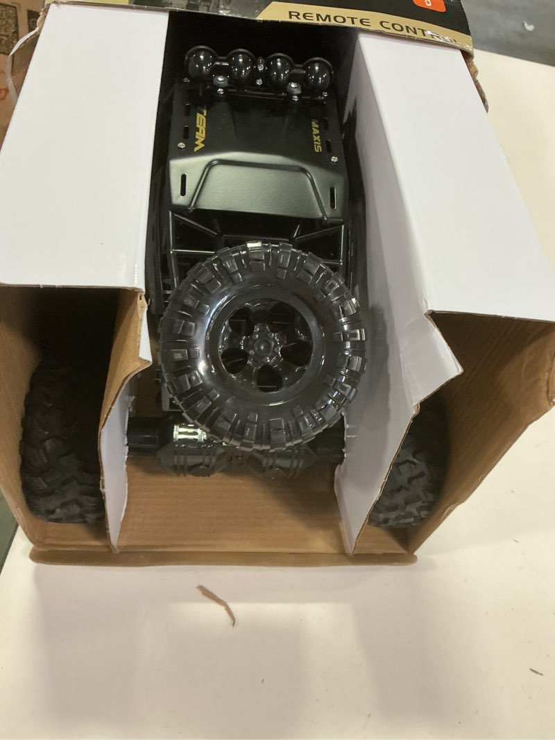 Condition photo showing Good Condition for RC Cars Remote Control Car 1:12 Off Road Truck, Metal Shell LED Headlights Offroad Monster RC Truck, 4x4 All Terrain Hobby RC Cars Toys for Boys Kids Adults Gifts 8-12 Black