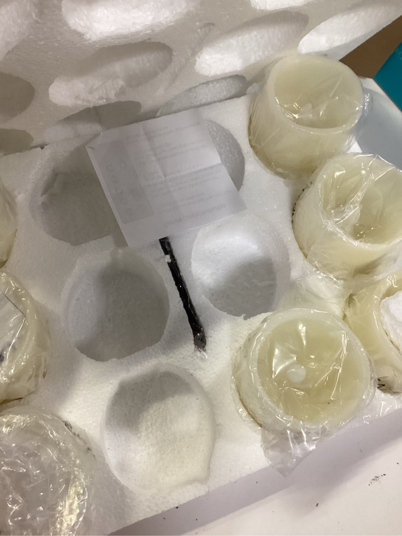 Condition photo showing New/Like New for flameless candles battery operated candles set of 7 (d:3\" x h:4\") pillar real wax led candles with 10-key remote and cycling 24 hours timer ivory set 12