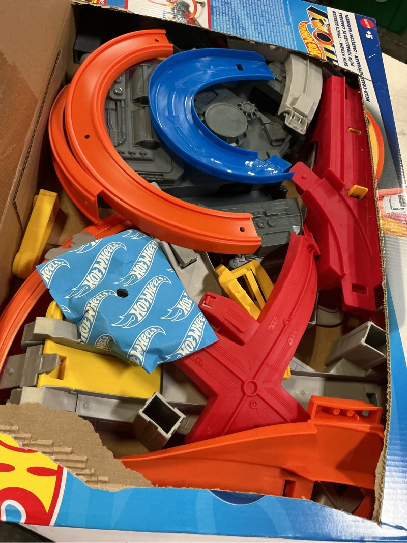 Condition photo showing Good Condition for Hot Wheels Track Set Spin Storm, 3 Intersections for Crashing & Motorized Booster, 1:64 Scale Toy Car (Amazon Exclusive)