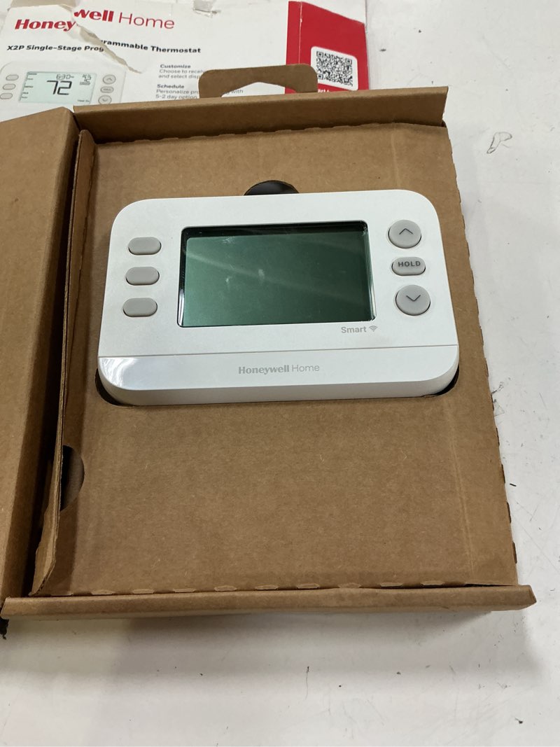 Condition photo showing As Is for honeywell home x2p heating and cooling push button programmable thermostat
