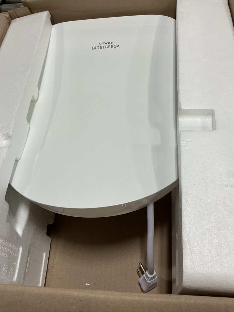 Condition photo showing As Is for coway electronic bidet round toilet seat with instantaneous water heating, heated seat and dryer, auto open and close lid, night light, deodorizer, stainless nozzle, remote control 500s 500s round