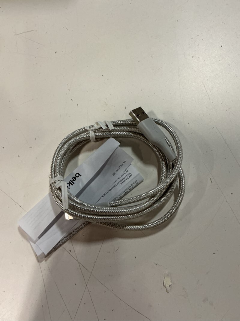 Condition photo showing As Is for belkin 24w dual-port usb-a wall charger + 5ft. lightning to usb-a cable, silver