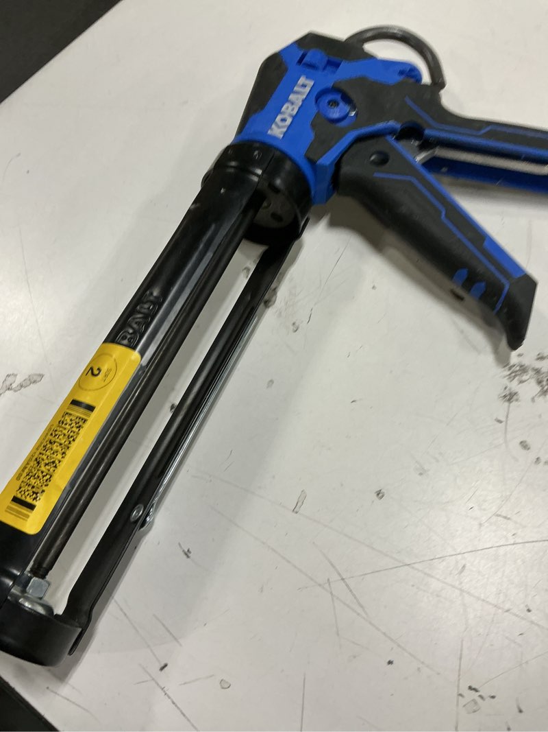 Condition photo showing As Is for Kobalt Dual Thrust 10 -oz Anti-Drip Smooth rod Caulk Gun
