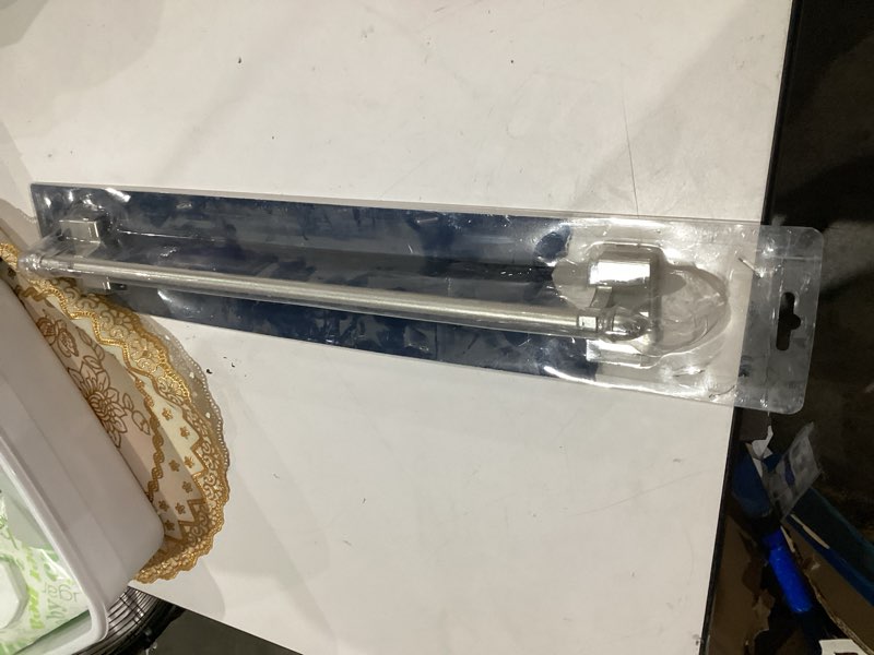 Condition photo showing As Is for project source 16-in to 28-in silver steel single curtain rod