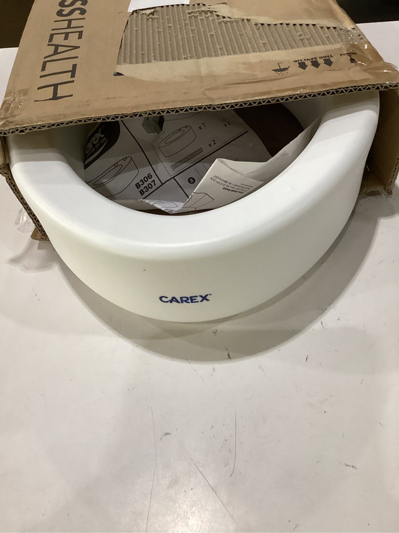 Condition photo showing As Is for carex toilet seat riser, elongated raised toilet seat adds 3.5 inches to toilet height, for assistance bending or sitting, 300 pound weight capacity toilet riser