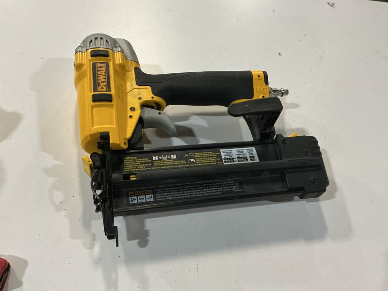 Condition photo showing As Is for DEWALT Brad Nailer Kit, 18GA, 5/8-Inch to 2-Inch, Pneumatic (DWFP12231)