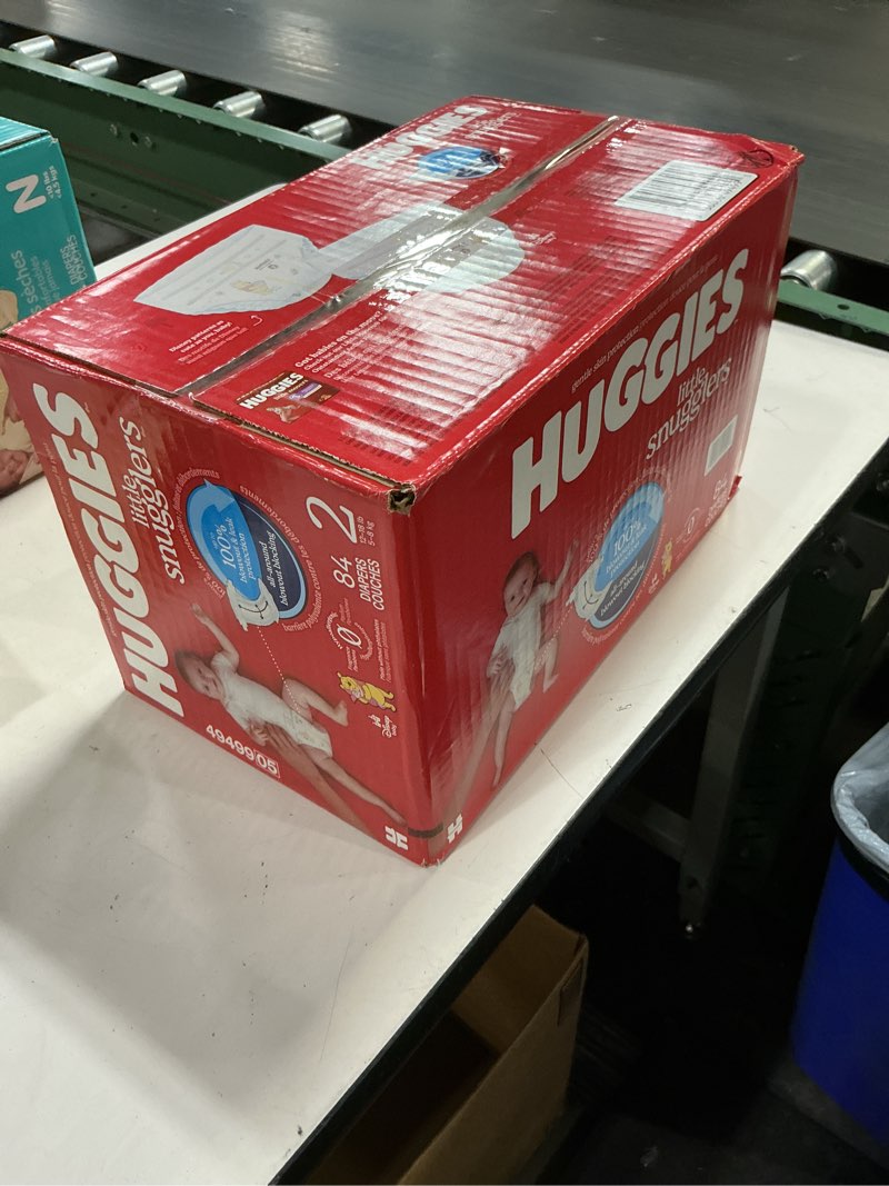 Condition photo showing New/Like New for huggies size 2 diapers, little snugglers baby diapers, size 2 (12-18 lbs), 84 count, packaging may vary size 2 84