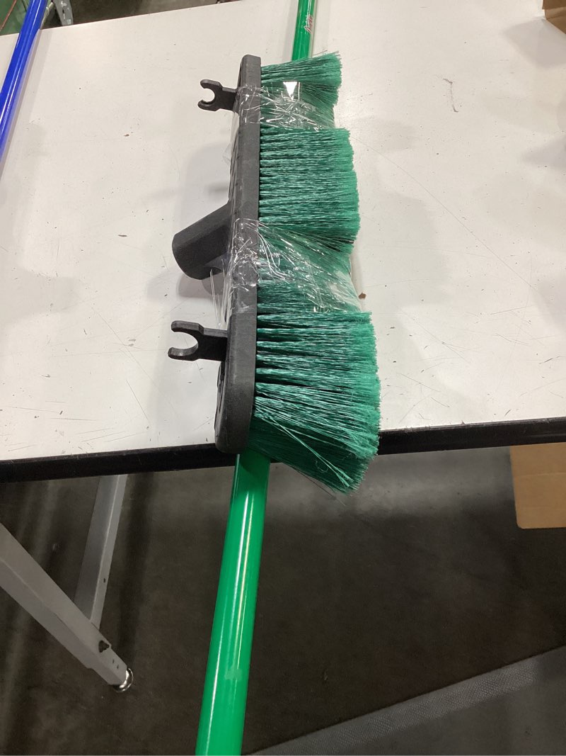 Condition photo showing As Is for quickie bulldozer multi-surface push broom 18 inch, green, steel handle with swivel hang-up feature, indoor and outdoor cleaning, sweep sidewalks/warehouses, dirt, debris