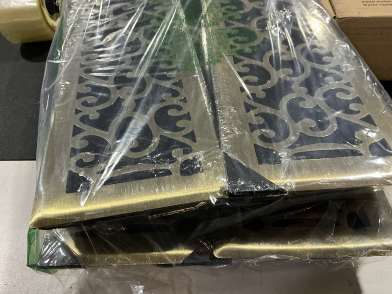 Condition photo showing Good Condition for 4x12 inches 4 pack heavy duty walkable floor register - easy adjust air supply lever decorative floor vent covers, savannah design vent covers for home - antique brass 4x12 inches antique brass 4pcs