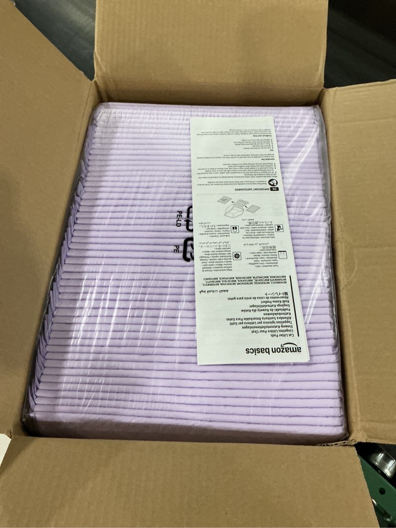 Condition photo showing New/Like New for Amazon Basics Cat Pee Pads, 100 Count, Universal Fit for Litter Box, Odor Control with Fresh Scent, White/Purple Fresh 16.9 x 11.4Inch