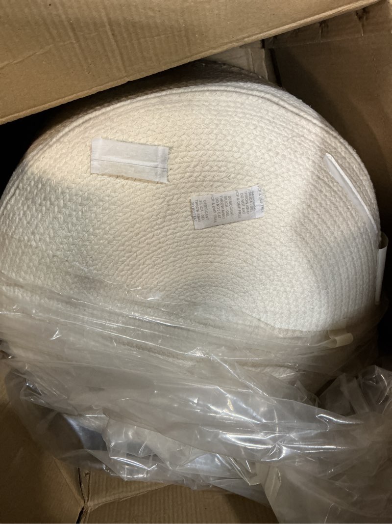 Condition photo showing Good Condition for signature design by ashley sweed valley jute & cotton pouf, 19 x 19 inches, beige & white
