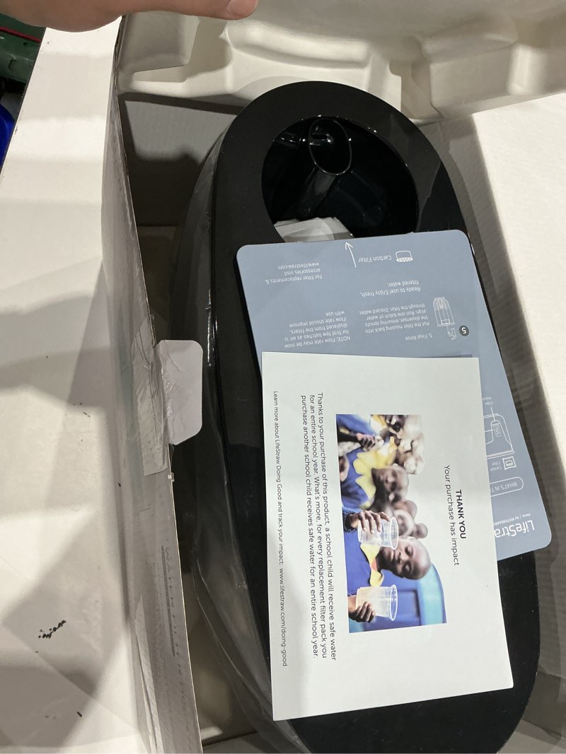 Condition photo showing As Is for lifestraw home– water filter dispenser, 18-cup obsidian 18-cup