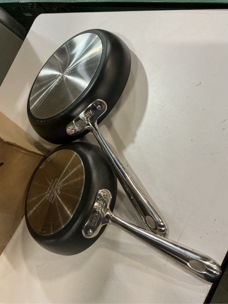 Condition photo showing As Is for 2 sets) All-Clad HA1 Hard Anodized 8 inch & 10 inch fry pan set
